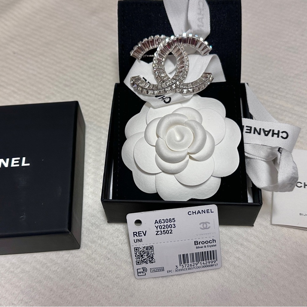 New with tax 
Chanel brooch.
